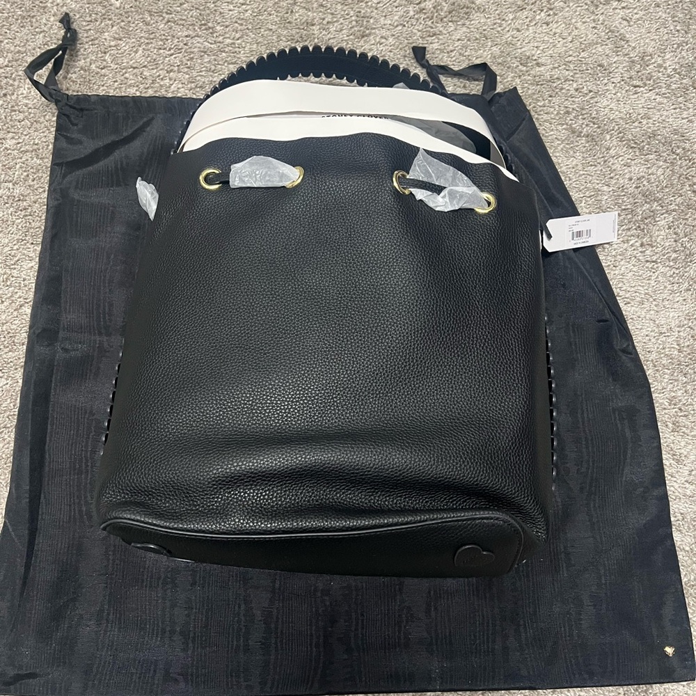 Black Pebbled Leather Bucket Bag with White Strap